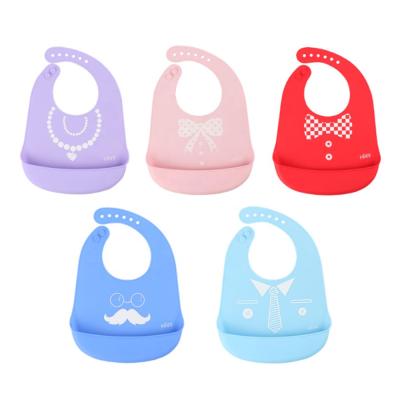 China Hot Selling Sustainable Waterproof Easily Adorable Clean Adjustable Snaps In Appetite Stimulating Colors Silicone Baby Feeding Bib for sale