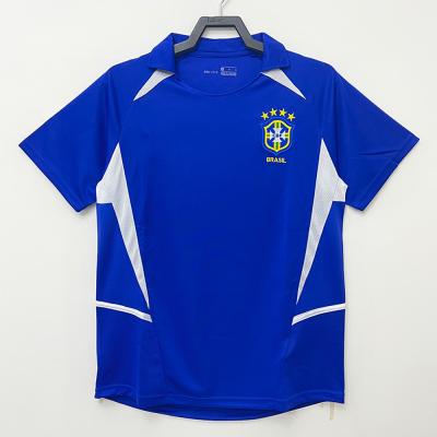 Cina Jersey blu di calcio del collo a V delle retro camice di calcio della saia della banda in vendita