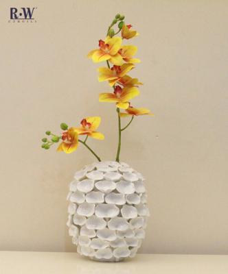 China Minimalist Home Decor Type Ceramic Over-Glazed And White Handmade Conch Shape Decorative Vase for sale