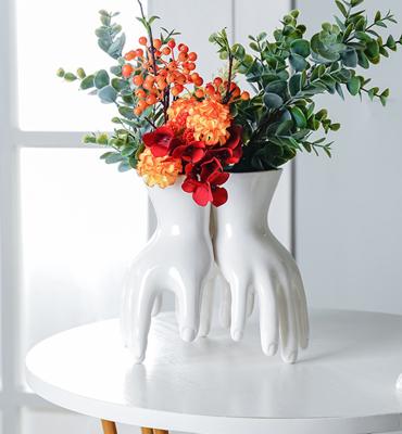 China Wholesale Minimalist China Design Artistic Modern Gift White Handmade Ceramic Hand Shaped Table Unique Wedding Flower Vase for sale