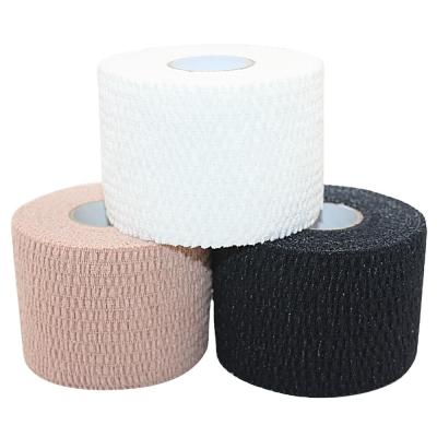 China Wholesale Elastic Cohesive Bandage Tear Able Stretch Sport Tape à venda