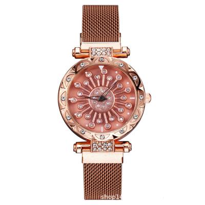 China Fashion Flower Rotating Dial Diamond Gold Watches Luxury women Wrist Quartz Watches Magnetic women watches for sale