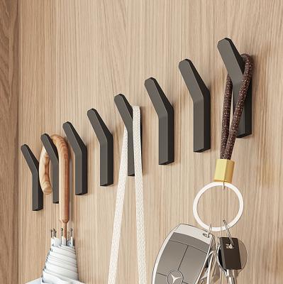 China Minimalist Black Coat Hooks Hand Towel Hanger Save Storage Space Bedroom Home Bathroom Robe Wall Mounted Hook for sale