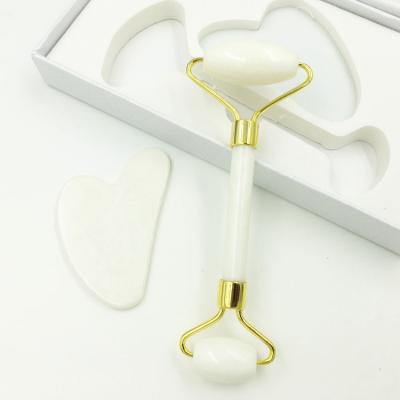 China Mini Jade Set Ice Roller Skin Care Wrinkle Remover OEM Dredge Lymph Natural Stone Jade Roller Guasha White Stone Tool for sale