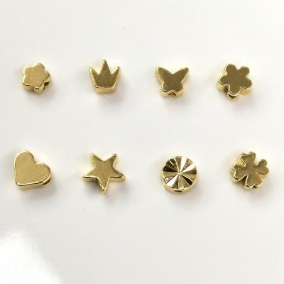 China Other Small Mini Tiny 14K Gold Plated Star Heart Plum Blossom Flower Wreath Brass Butterfly Spacer Bead For Jewelry Making for sale