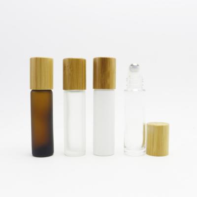 China Personal Care 5ml 10ml 15ml bamboo roll on perfume bottles essential oil glass bottle roller on bottle roller-23AN for sale