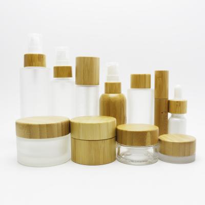 China Cosmetic in bamboo bottle BP-A2 4oz 5ml 10ml 15ml 30ml 50ml 100ml 120ml cream bamboo cosmetic packaging glass jar stock for sale