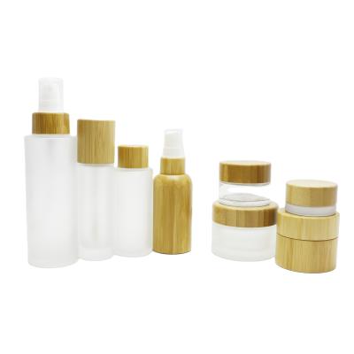 China Inventory 4oz 5ml 10ml 15ml 30ml 50ml 100ml 120ml Round Cosmetic Empty Glass Packaging Cosmetic Jar With Bamboo Lid BP-A3 for sale