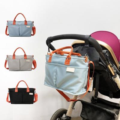 China 2021 New Mummy Diaper Bag Fashion Portable Anti-theft Lightweight Diagonal Outlet Small Diaper Bag Mummy Small Diaper Bag for sale