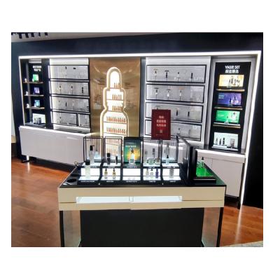 China Upright Retail Stores Gondola Counter Skin Care Makeup Backwall Store Display Stand for sale