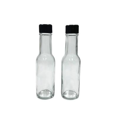 China Freshness 3oz 100ml Preservation Hot Sauce Glass Dazed Bottle With Black Plastic Lid for sale