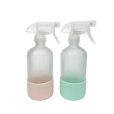 China Chemical 16oz 500ml Frosting Spray Glass Boston Round Bottle With Custom Silicone Sleeve for sale