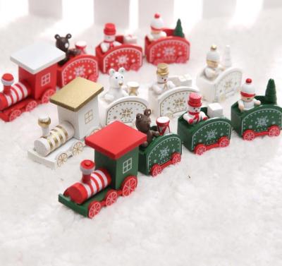 China 4 WOODEN Christmas Train Knots Painted Wooden Christmas Decoration for Home with Santa Kids Toys Ornament for sale