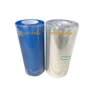 China Cold Hot Peel Ab A3 UV DTF Pet Film Roll Transparent DTF Transfer Film 60cm Custom for sale