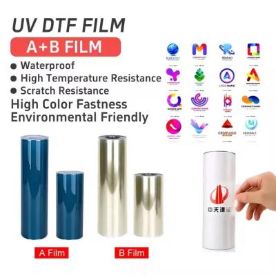 China Transferência de Dtf UV Ab Pet Film Roll Ab Transferência de Filme Dtf Pet A3 30cm UV Dtf Film para impressora UV à venda