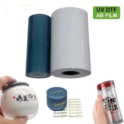 China UV DTF-filmpakket A*100m+B*100m Film 0,6*100m voor rollen UV-printer labelsticker UV DTF AB-films Te koop