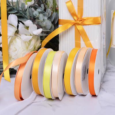 China High Tenacity Ribest Double Faced Satin Ribbon For Cake Wrapping Bows Customized 9MM Yellow Wholesale for sale