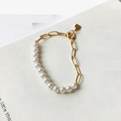 China Lower price fashionable ladies personalized bangle wrap pearl metal chain personality niche design simple stitching bangle for sale