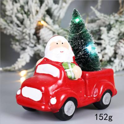 China Newcomer Traditional Santa Claus Driving Motor Ceramic Resin Crafts with Christmas Decor for sale