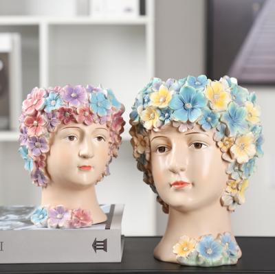 China Worldwide New Design 2021 Resin Woman Flower Vase For Main Household And Indoor Decoration for sale