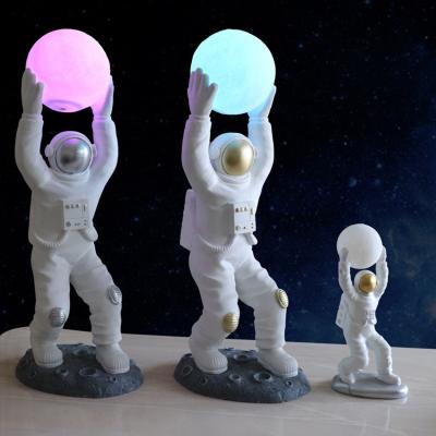 China Global New Product Nordic Cute Astronaut LED Bedside Night Light Table Light For Home Designer Living Room Kids Bedroom Table Lamp for sale