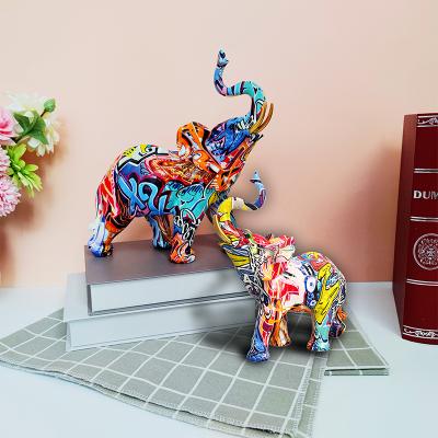 China Beautiful world high quality transfer printing figurines animal statue home decoration in resin elephant for sale