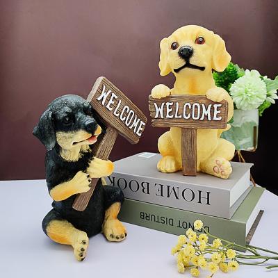 China Europe Polyresin Lovely Dog Statue Welcome Resin Garden Dog Puppy Decoration for sale