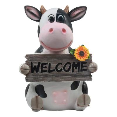 China Whimsical Cow To Europe Holstein With Welcome Sign Statue Sunflower Cow Garden Greeter Figurine for sale