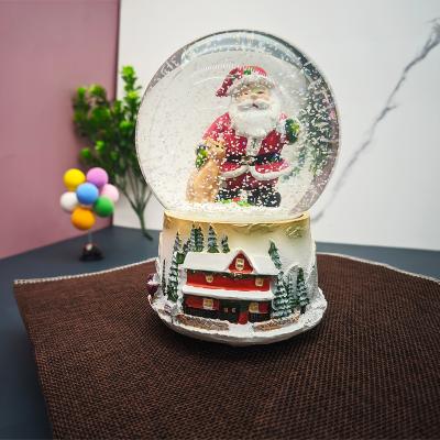 China Traditional Classic Santa Claus Resin Snowball with Music Function for Home Decor for sale