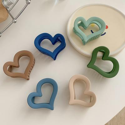 China European and American style women hair accessories simple candy color heart shape acrylic hair claw clip for woman girls hair accessories for sale