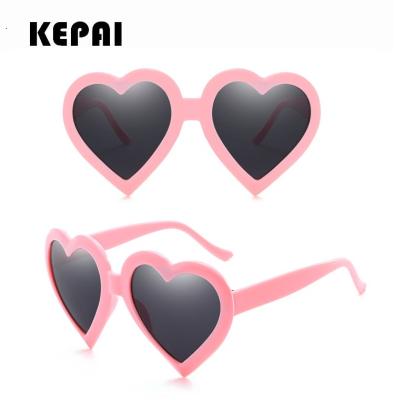 China Fashion Sunglasses Women Love Heart Shape Lens Frame Fancy Sunglasses Stylish Plastic Glasses for sale