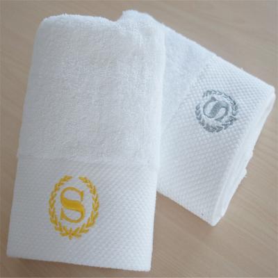 China Compressed Factory Price Customize Embroidery Logo White Cotton Hand Towel Wholesale for sale