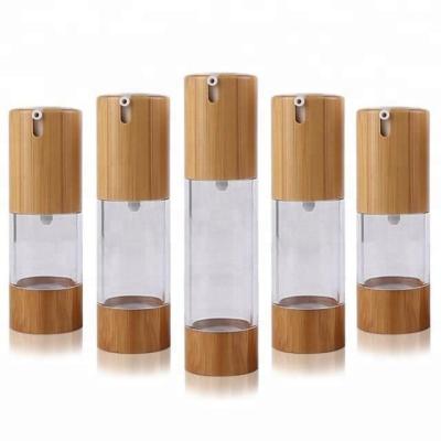 China Recyclable Lotion Essence Emulsion Clear Airless Pump Bottle 30ml 1oz With Bamboo Lid And Bamboo Base for sale