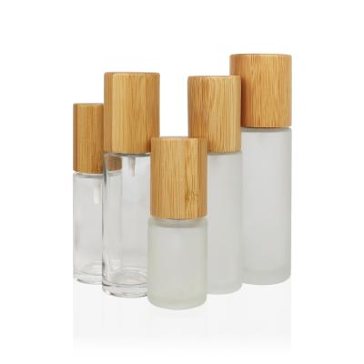 China Bamboo Cosmetic Bamboo Bottle Face Cream Bottle Skin Care Cosmetic Frosted Glass Lotion Pump Bottle for sale