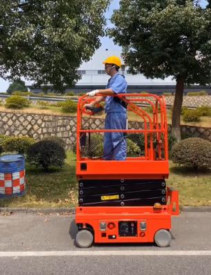 China Los 6m automotores 250kg Mini Scissor Lift Working Platform en venta