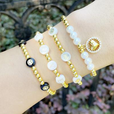 China Hiphop 2021 Handmade Gold Stack Moonstone Bead Stretch Plastic Bracelets For Women for sale