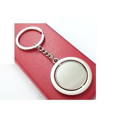 China Metal Key Chain Gift Send Rotating Round E-183 Key Chain Metal Key Chain Customized LOGO Zinc Alloy Key Chain for sale