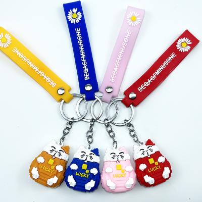 China Key Souvenir E-220 Lucky Cat Soft Rubber Pendant New Year Promotional Gift Doll Backpack Car Key Chain Pendant for sale