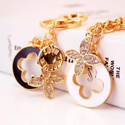 China Luxury High Quality Four Leaf Clover Crystal Zinc Alloy Rhinestone Souvenir Promotional Fashion Gift Key Chains Charm Jewelry Key Chain Plating Accessories for sale