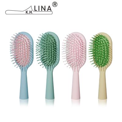 China Small Home Round Plastic Pocket Hair Bulk Comb With Hair Band For Kid Lady for sale