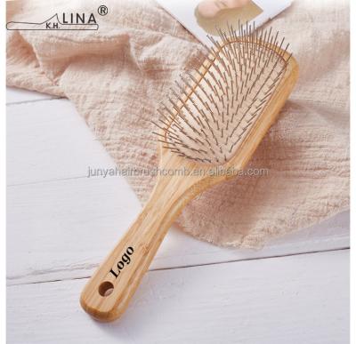 China Wooden Cushion Hair Brush Metal Pins Painted Wood With Rubber Twist Grip Tangle for sale