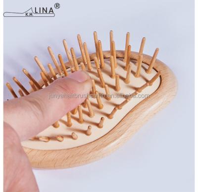 China Custom Cushion Airbag Wooden Baby Comb Logo Design Handle Non-slip Wood Mixed Steel Scalp Massage Paddle Detangling Hair Brush Set for sale