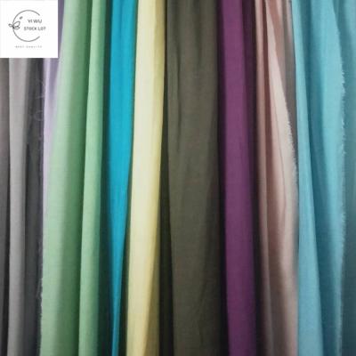 China Anti Pill China 30s Woven Rayon Plain Dyed Fabric Stock Lot For Garment for sale