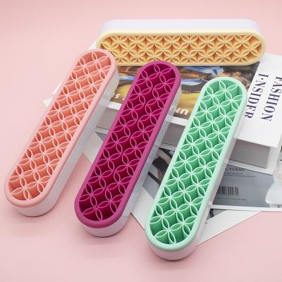 China Fashion Silicone Wholesale Shelf Cosmetic Brush Holder Makeup Brushes Drying Storage Rack for sale