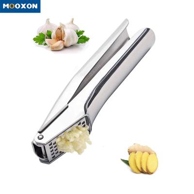 China Viable Stainless Steel Grinder Peeler Ginger Garlic Mincer Kitchen Utensils Chopper Garlic Press Garlic for sale