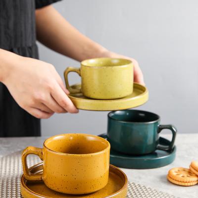 China Sustainable Custom Yellow Ceramic Kiln Change Coarse Pottery Tea Coffee Cup And Saucer Set For Office for sale