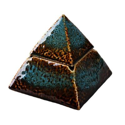 China Minimalist Creative Ceramic With Lid Pyramid Type Anti-fly Ashtray Personality Trend Living Room Office Decoration Creative Home Ashtray for sale