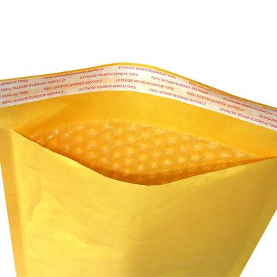 China Recyclable Free Sample Lightweight Jewelry Packaging Plastic Kraft Paper Bubble Mailer for sale