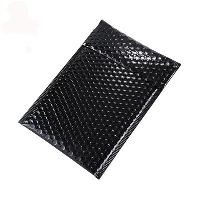 China 150*190+40mm Amazon Express Shipping Mailer Wholesale Colored Bubble Shockproof Metal Mailer And Black Padded Envelope for sale