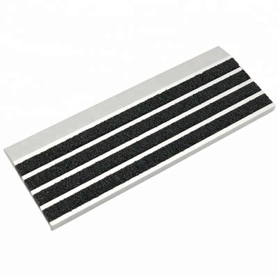 China Self Adhesive Stair Edge Protector Carborundom Insert Stair Nosing With Aluminum Base Extrusions for sale